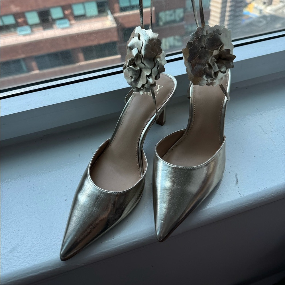 Gold pointed toe with gold leather flower detail mid height lace up heels